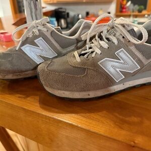New Balance ML574EVG Sneakers in Gray and White